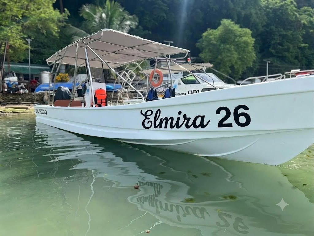 Private speed boat docked in El Nido, ready for charter